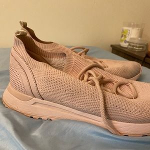Michael Kors baby pink trainers.